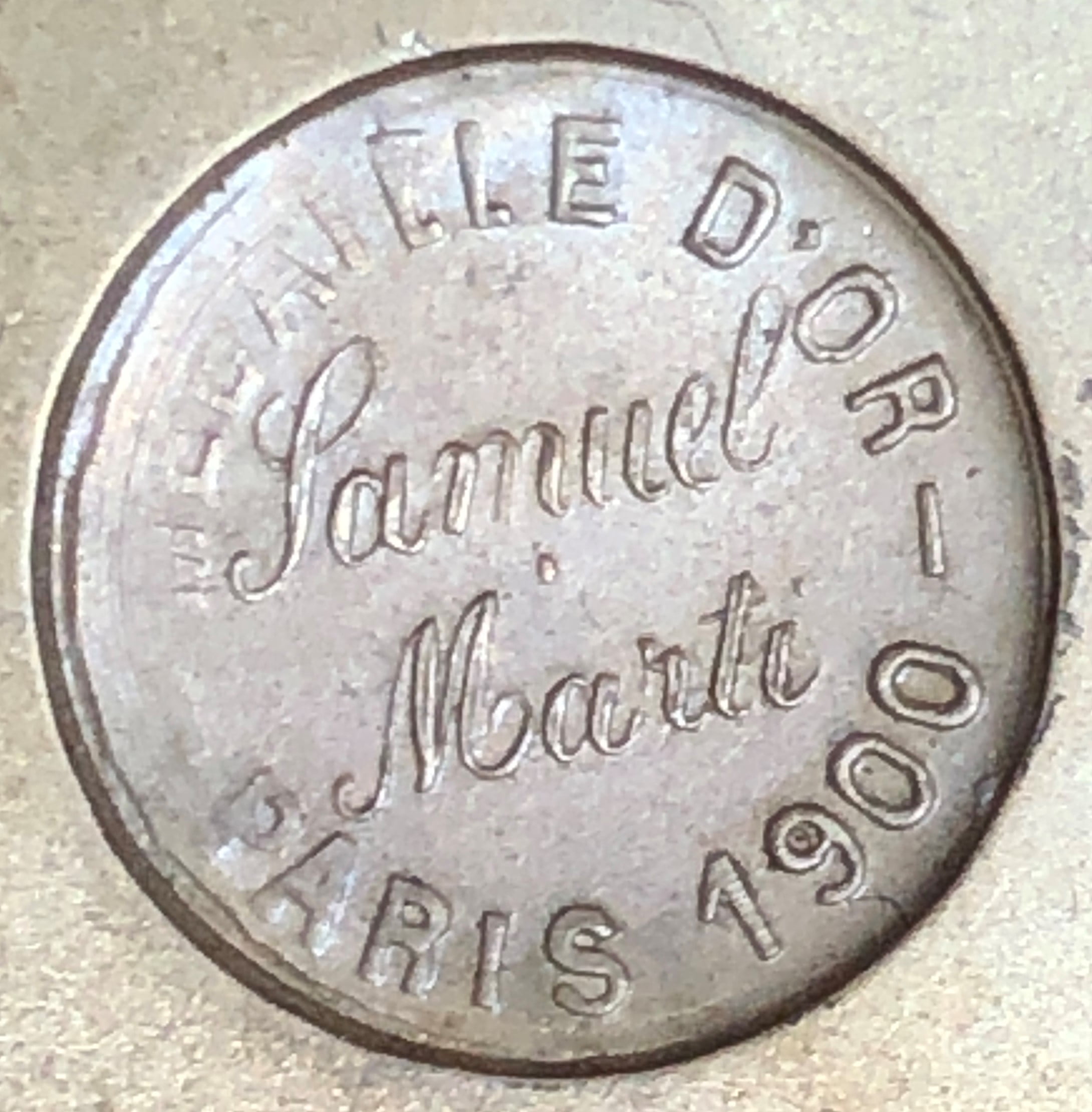 Medallion in close-up of the Samuel Marti Paris 1900 Gold Medal